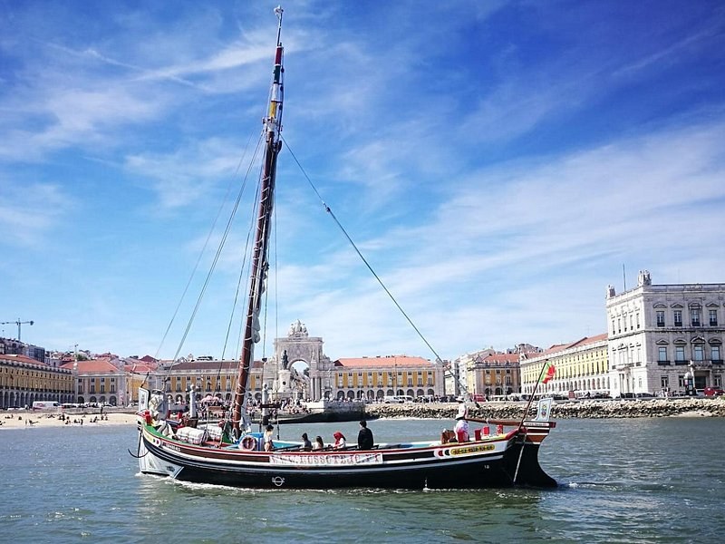 A traditional river boat off the arcaded riverside square downtown